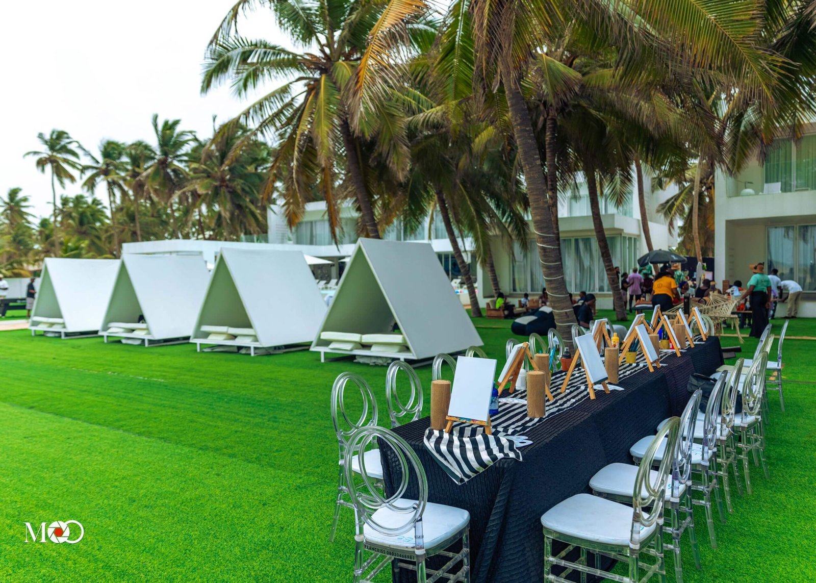 Beach party in Lagos Ilashe with guests enjoying music, food and ocean view